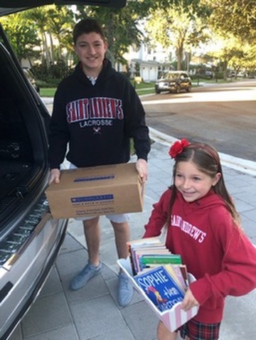 Loading a book donation into the car