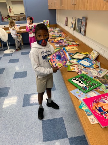 Picking out a book of his own